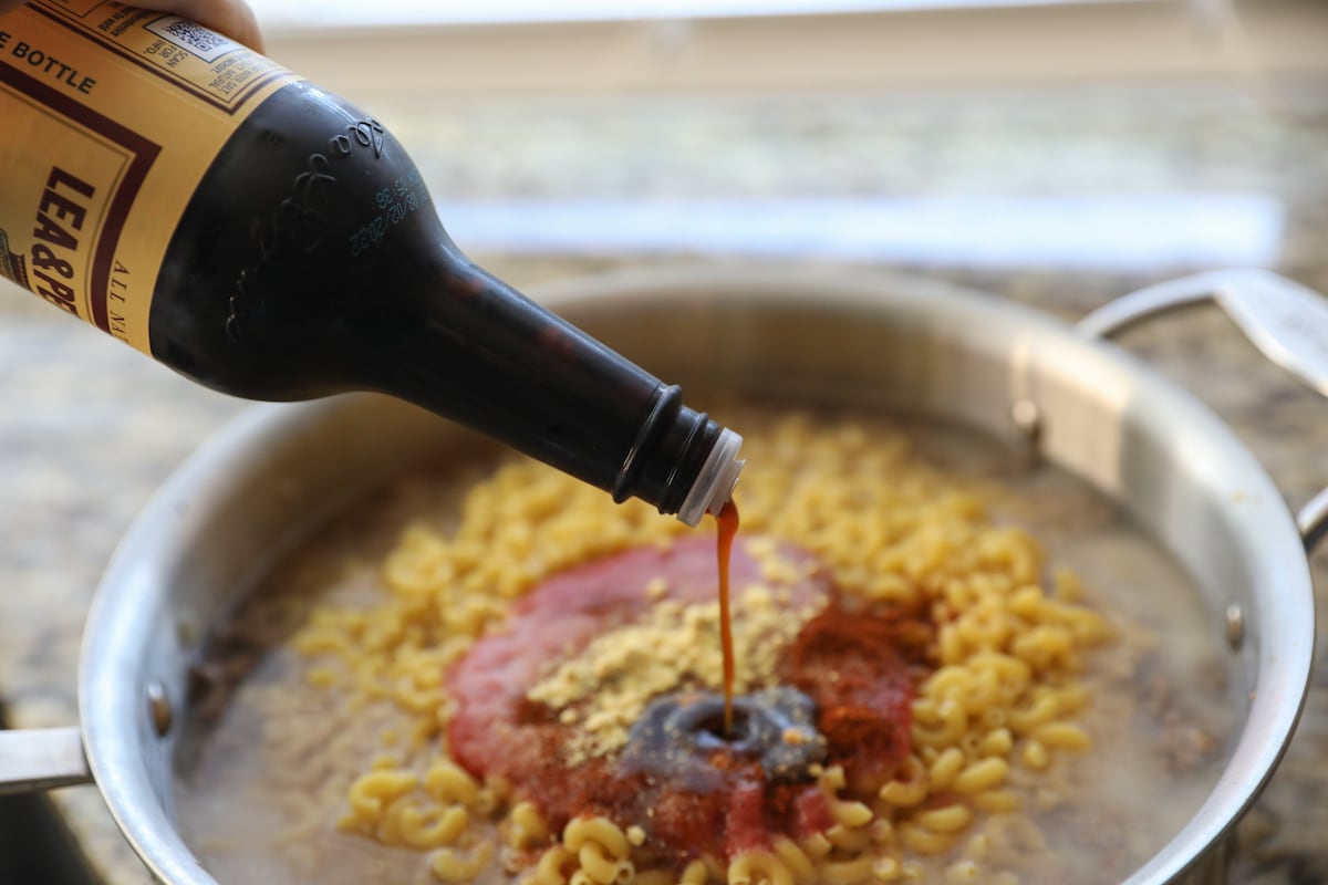 adding Worcestershire sauce to skillet