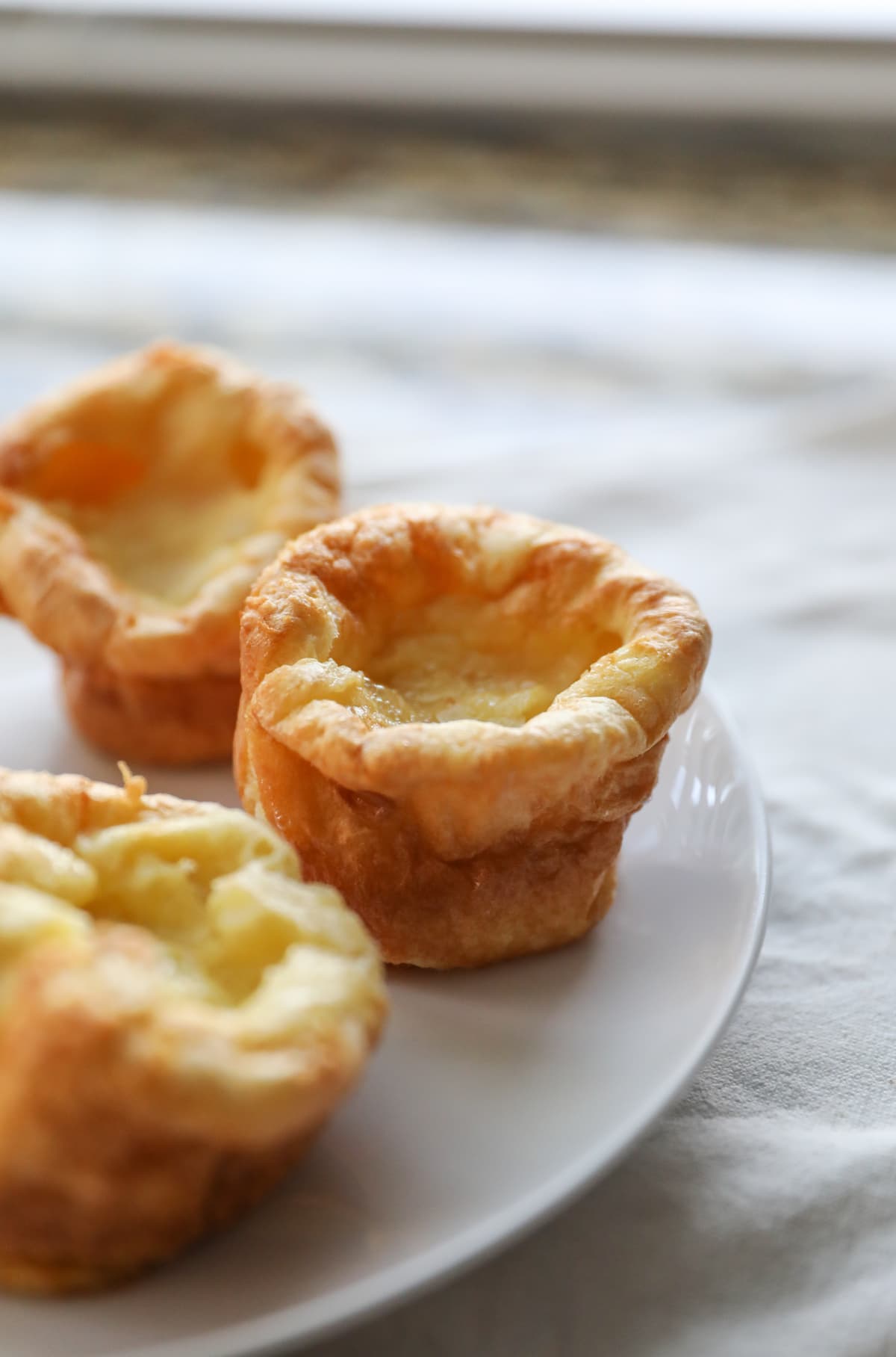 yorkshire puddings on white plate