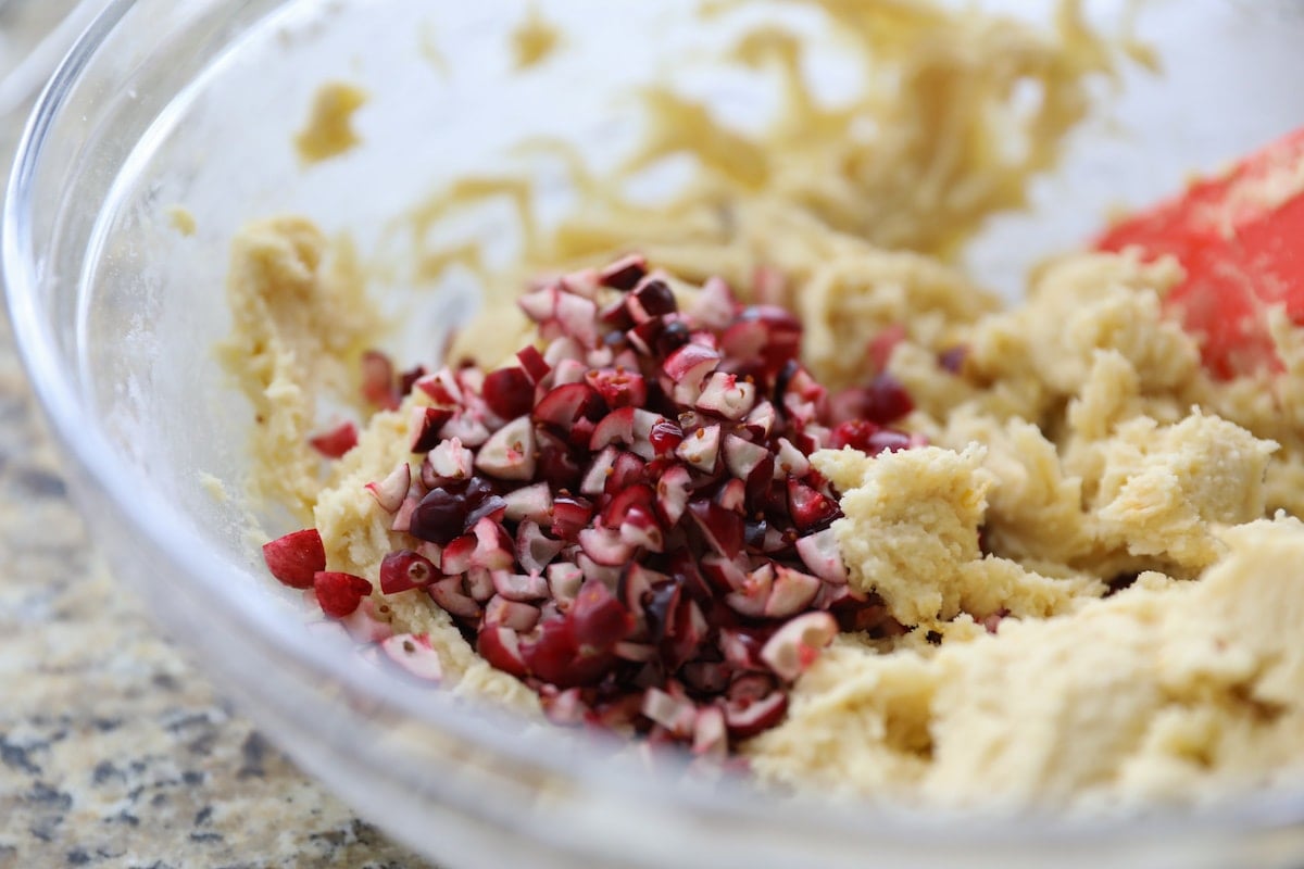 chopped cranberries in cookie dough