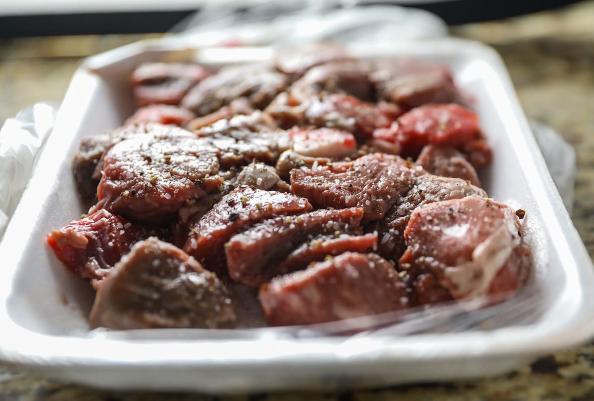 stew meat with salt and pepper