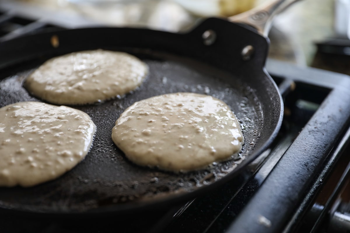 frying oatmeal pancakes on skillet