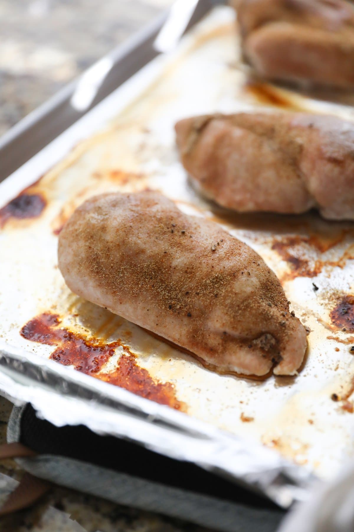 baked chicken on a sheet pan