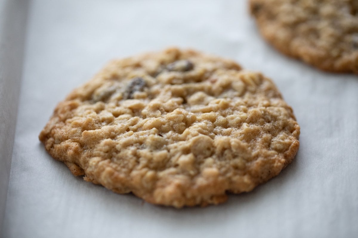 baked oatmeal raisin cookie on baking sheet