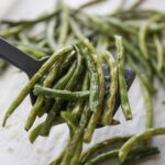 roasted green beans on spatula