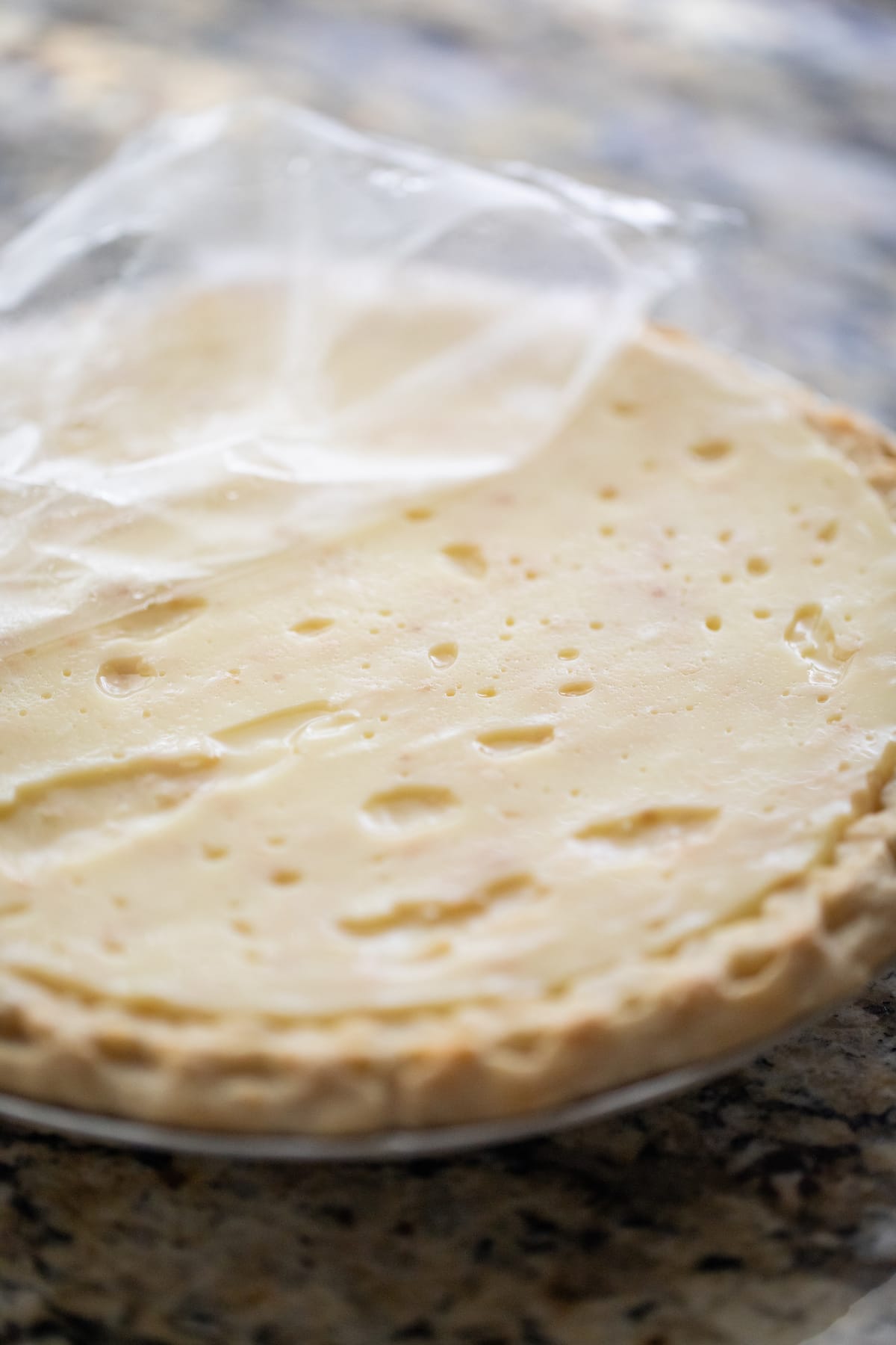 removing plastic wrap from chilled pie