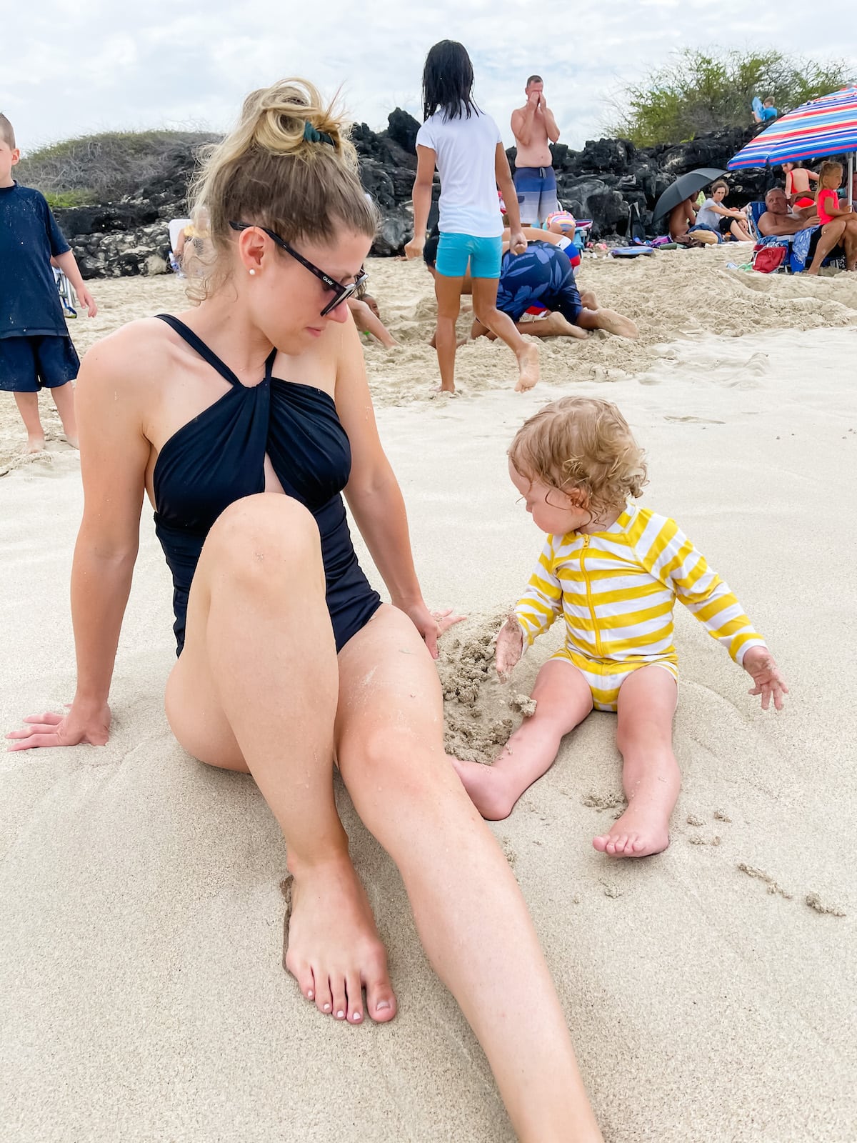 mom on beach with baby