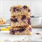a stack of three slices of lemon blueberry cake