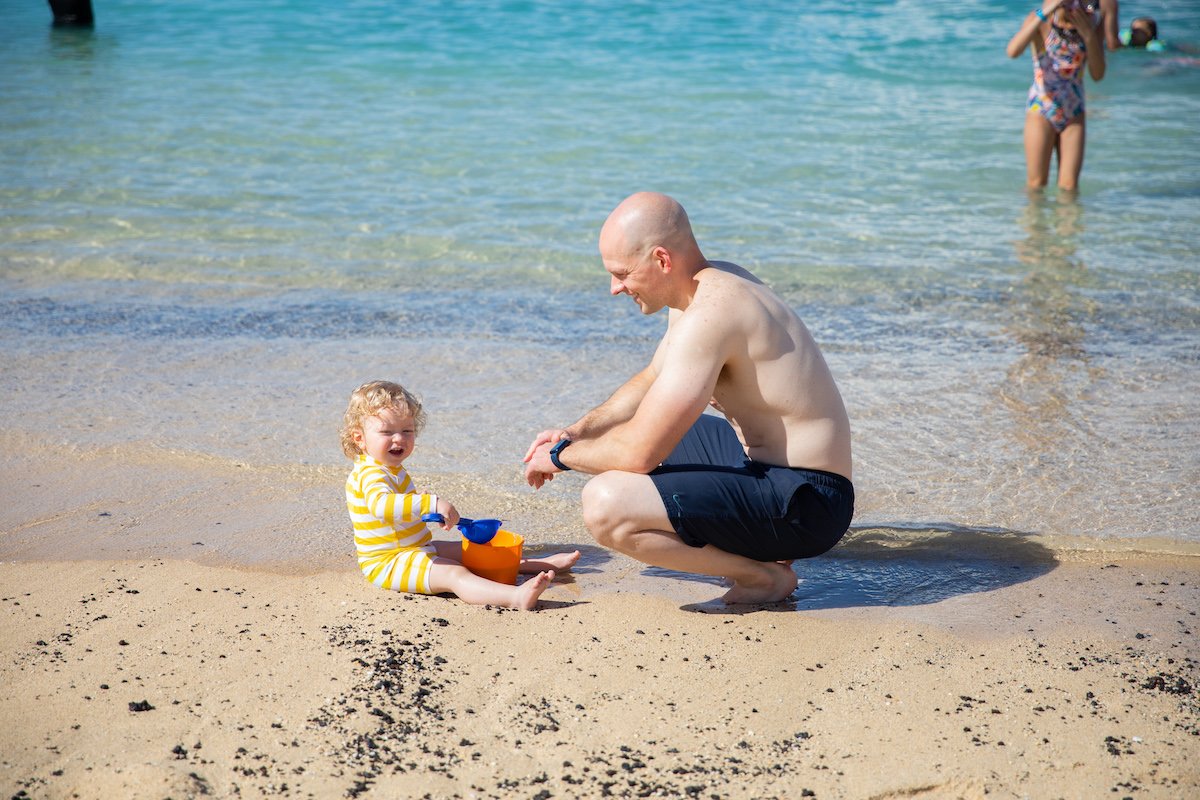 dad and baby on beach