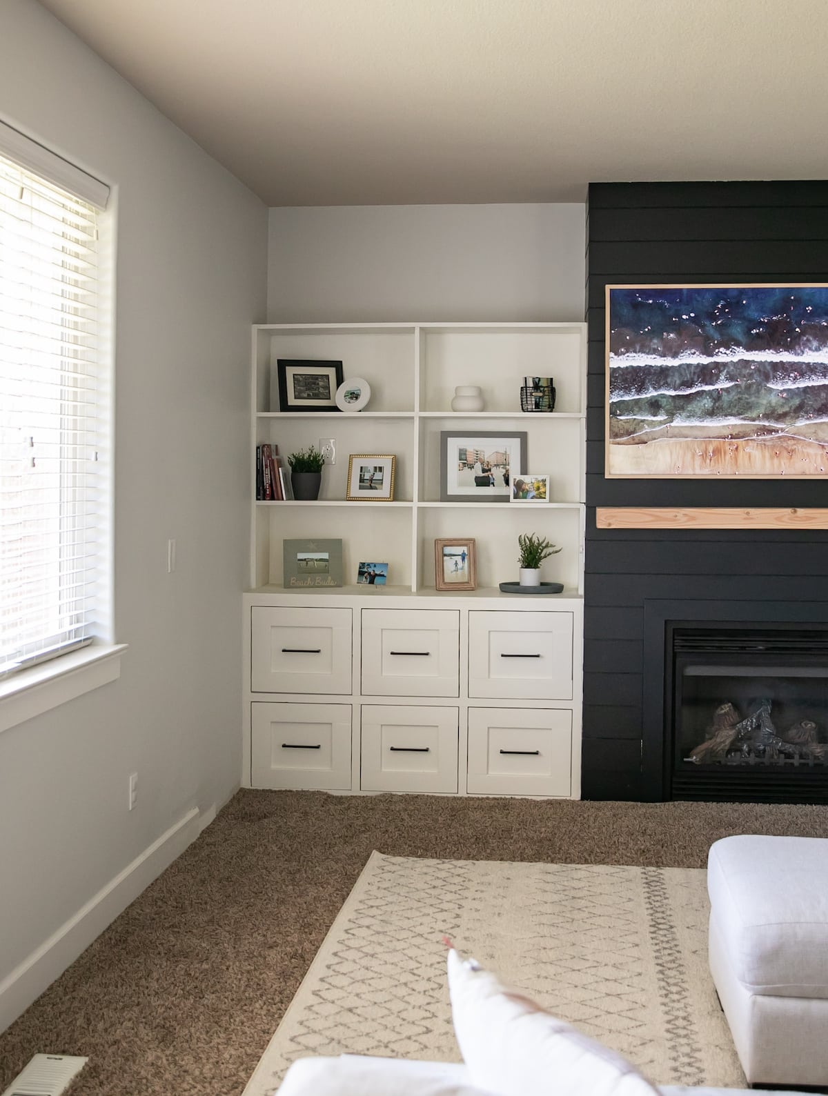 living room fire place with built-ins