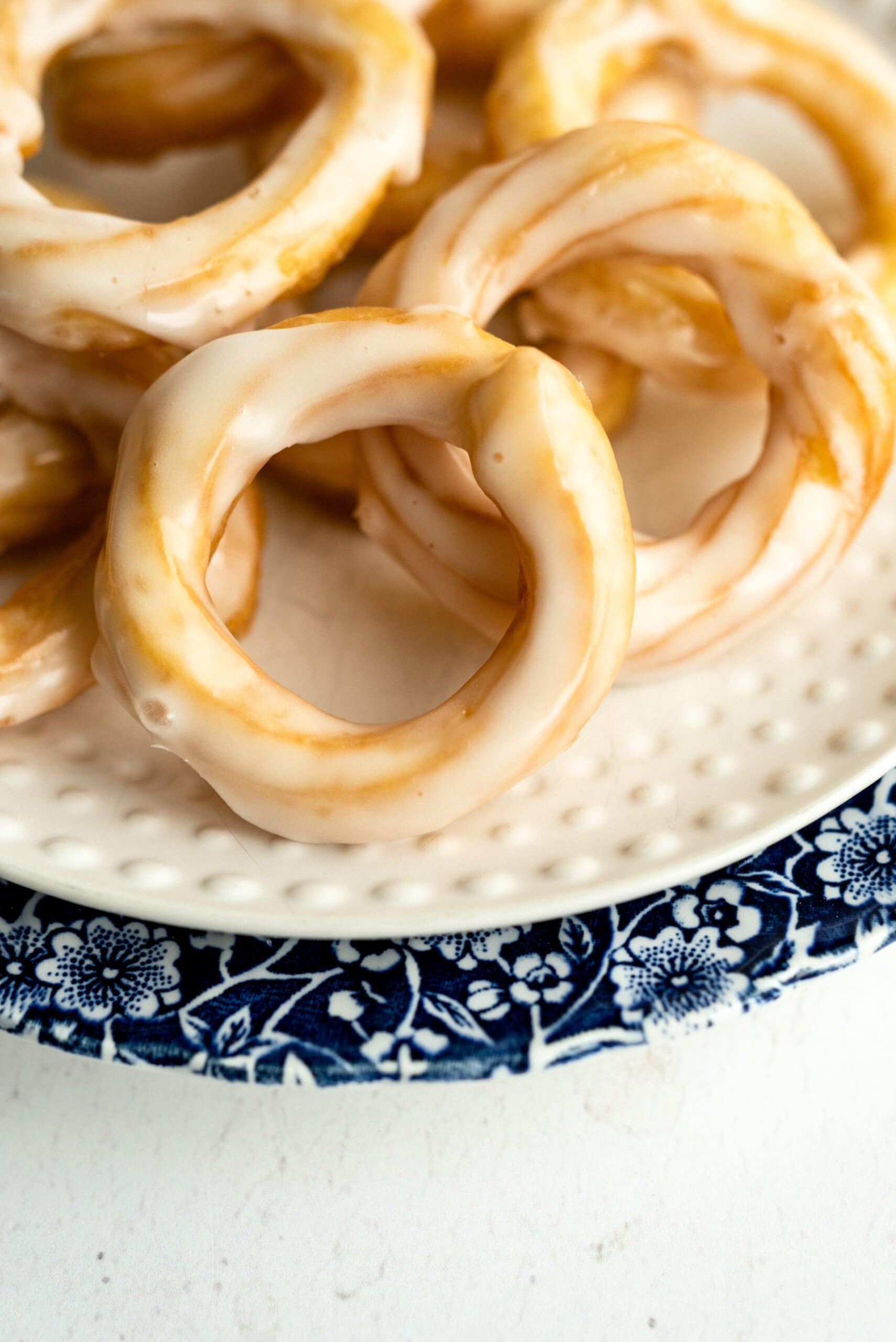 top down view of crullers on a plate