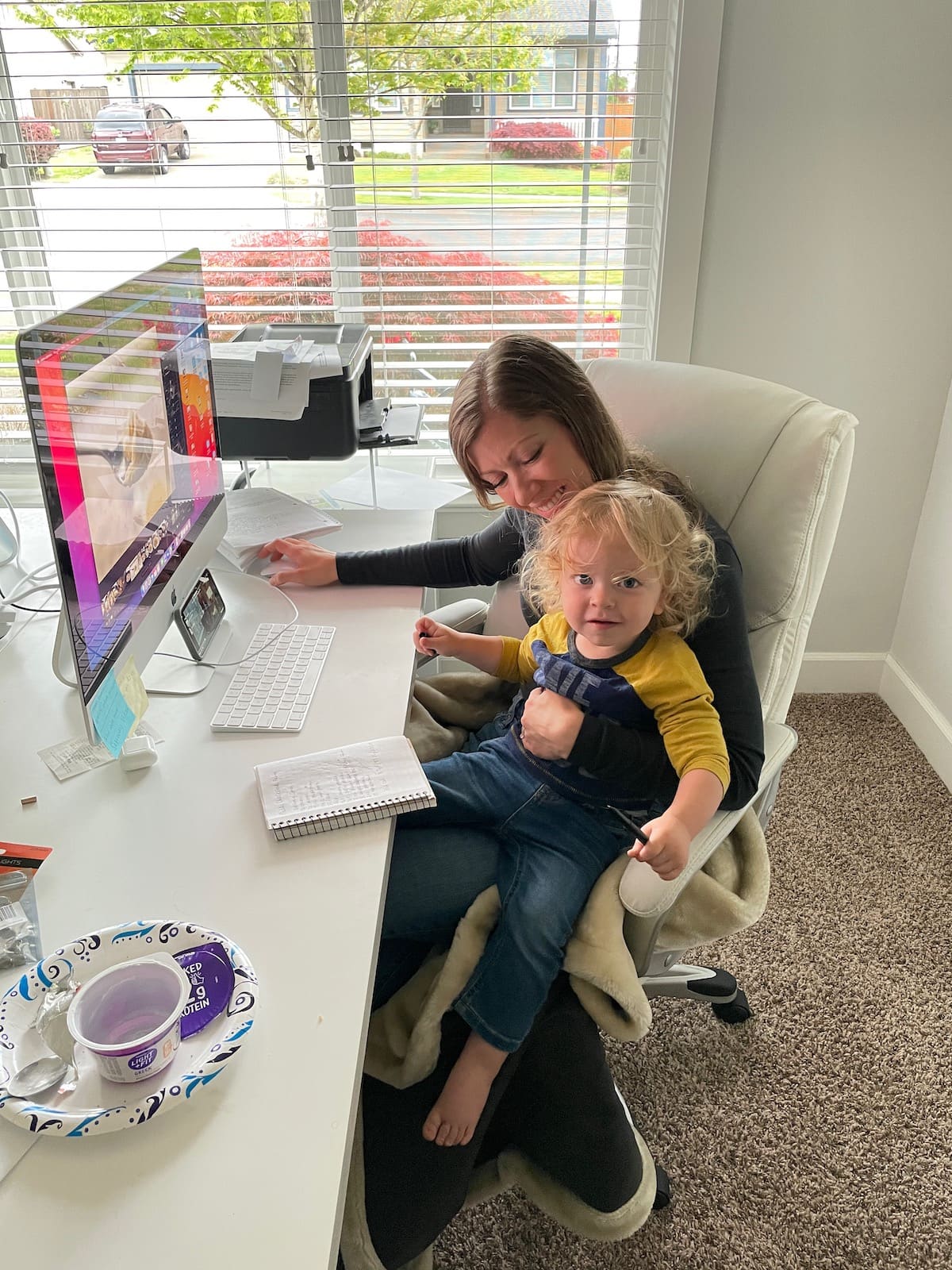 mom with baby on lap in office