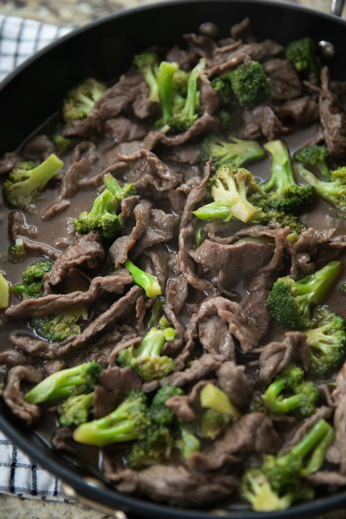 beef and broccoli in skillet