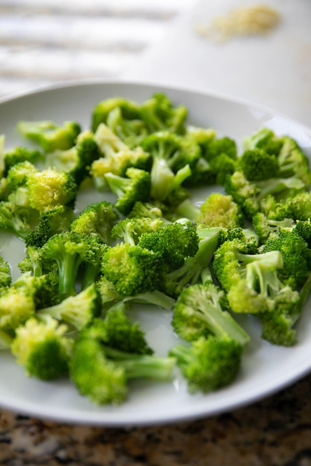 steamed broccoli on plate