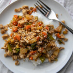 turkey teriyaki over rice on plate