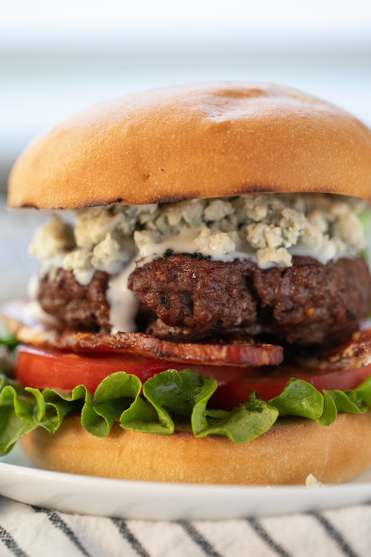 close up of a bacon blue cheese burger