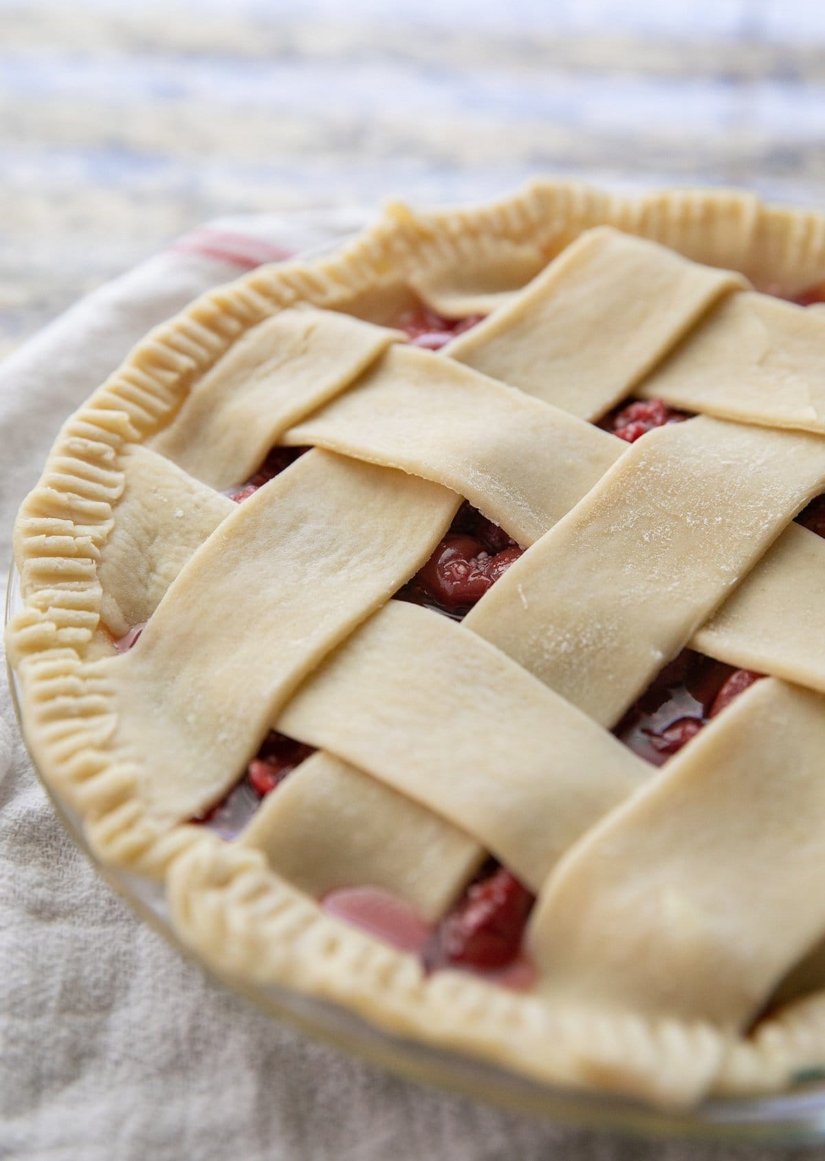 unbaked tart cherry pie with a lattice top