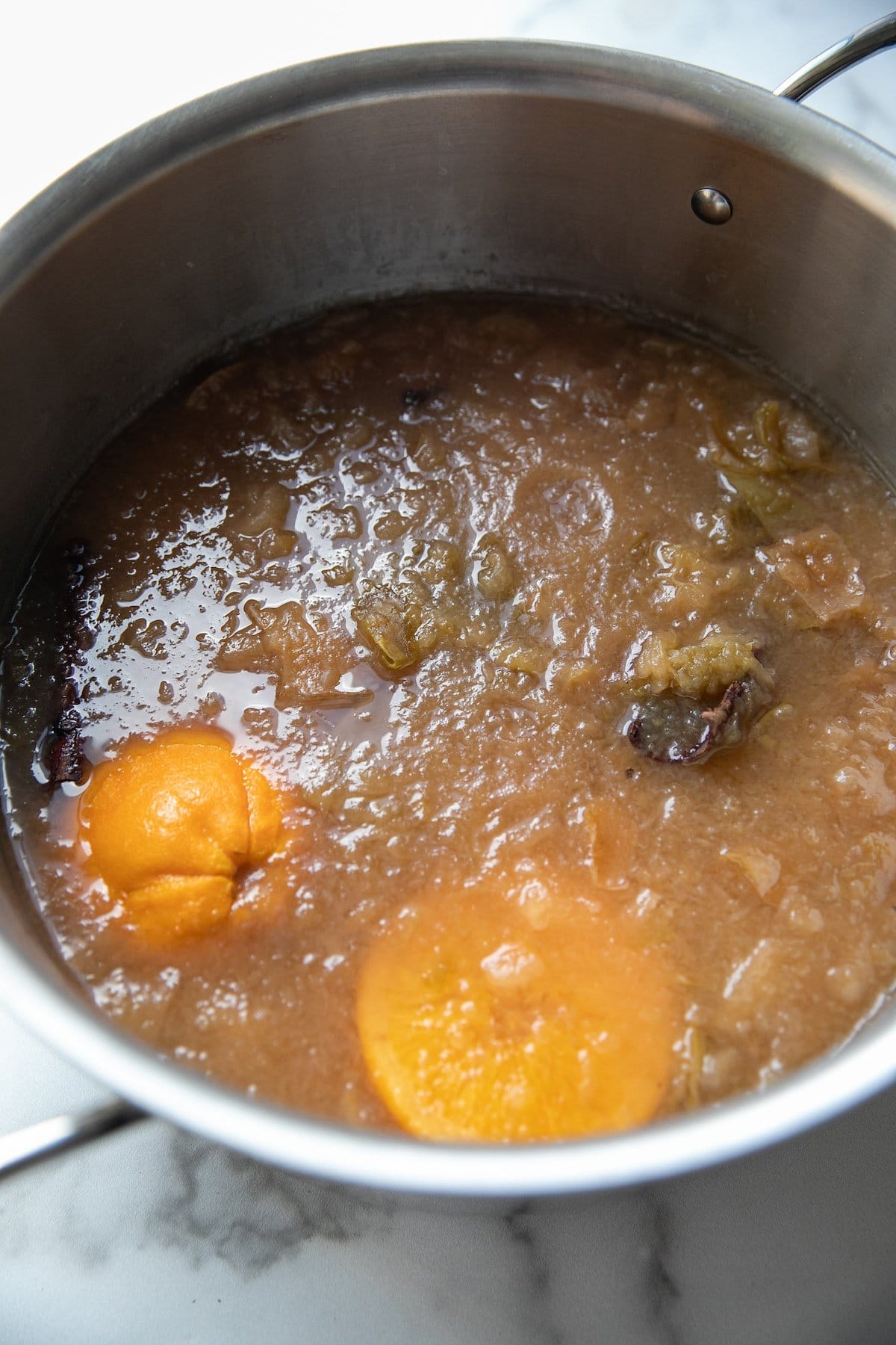 cooked and mashed apple cider mixture in a pot