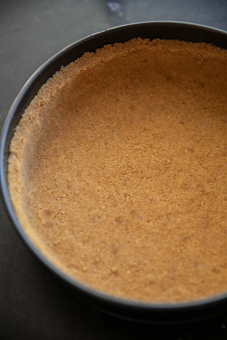 graham cracker crust in a springform pan