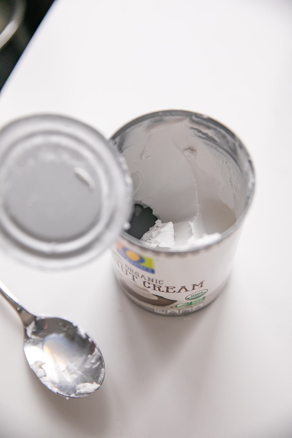open can of cream of coconut