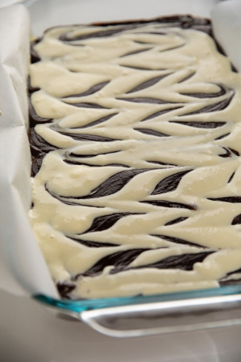 cheesecake brownies swirled into batter