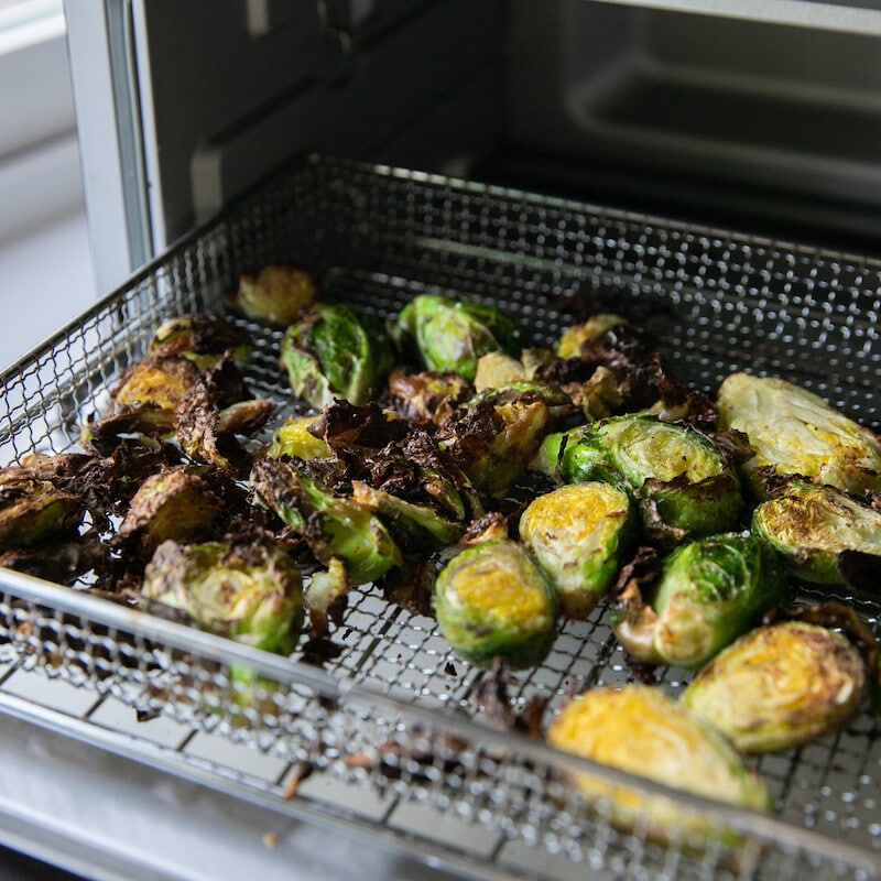 air fried brussels sprouts in air fryer basket