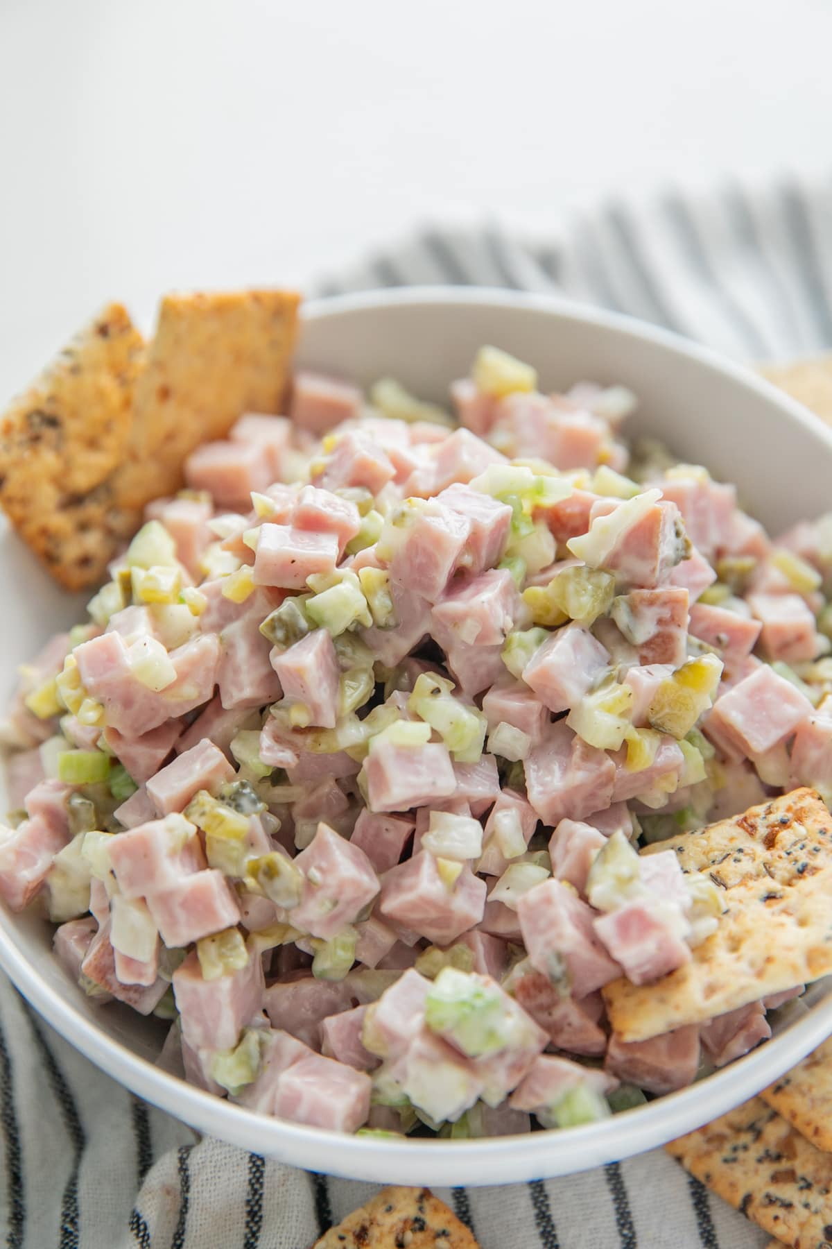 ham salad in bowl with crackers