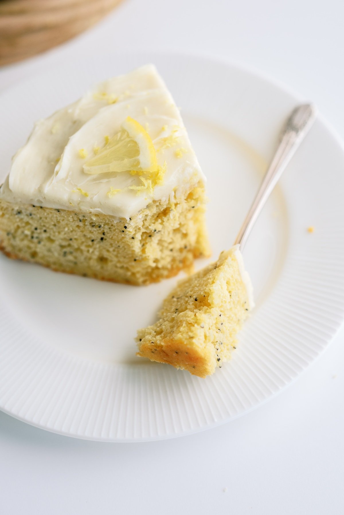 piece of lemon poppyseed cake on plate