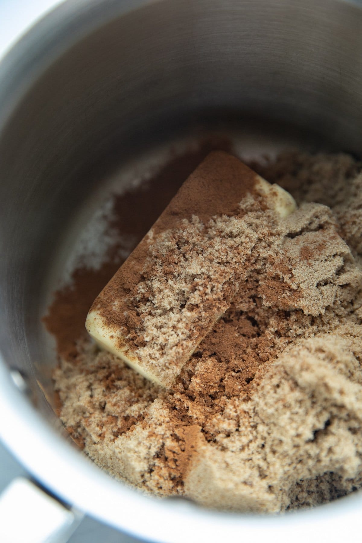 butter, brown sugar and cinnamon in pot