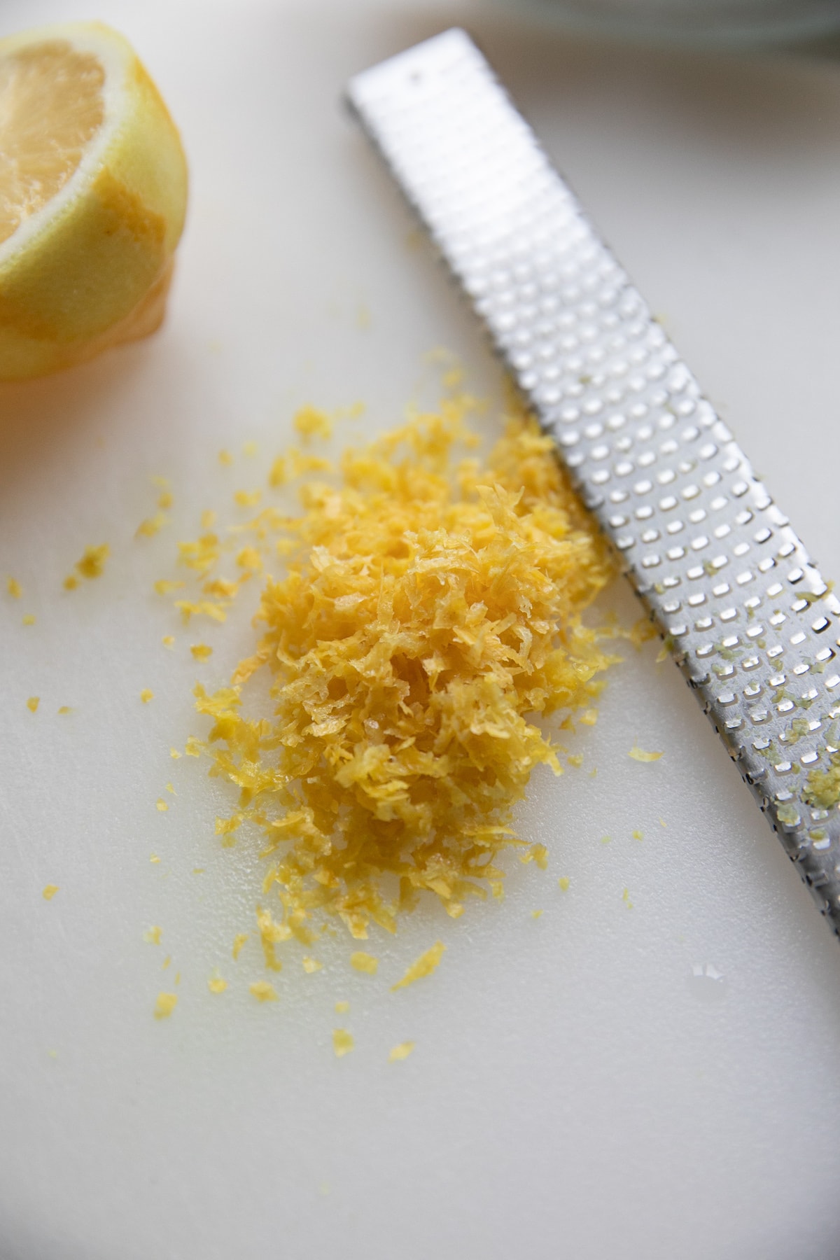 lemon zest on cutting board