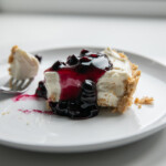 slice of no bake blueberry cheesecake on plate