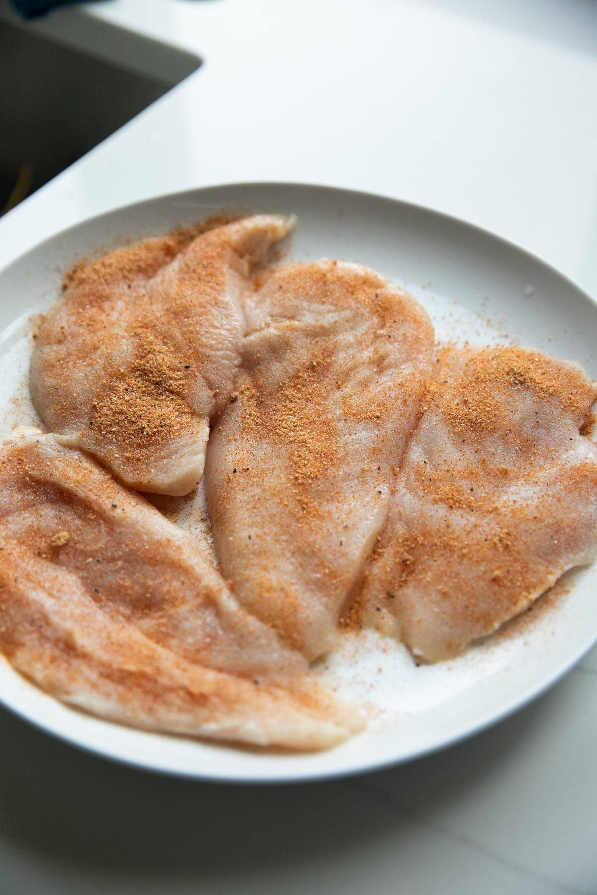 raw chicken with dry rub