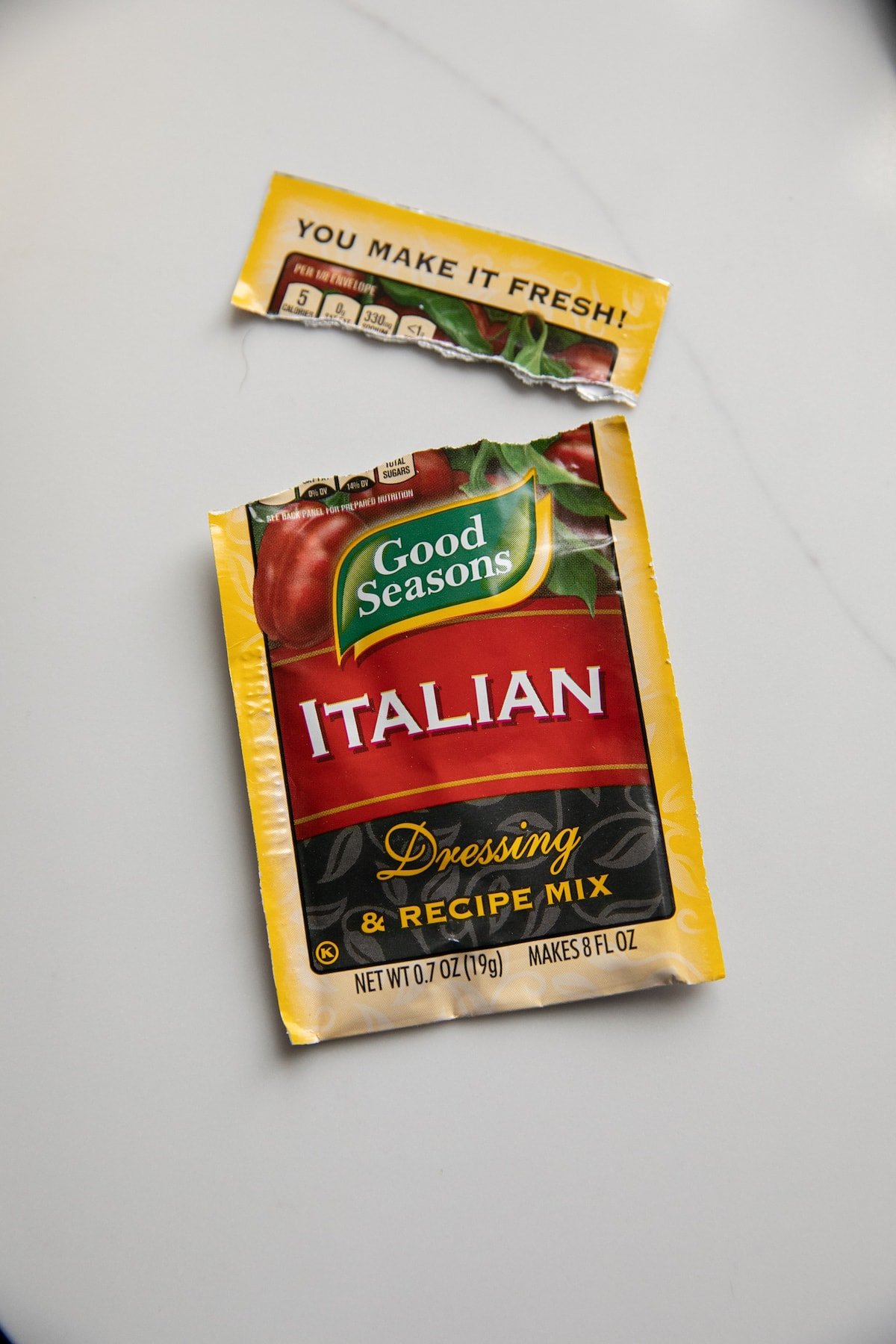 open italian seasoning packet on counter