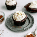 chocolate-cupcakes-with-vanilla-frosting on plate