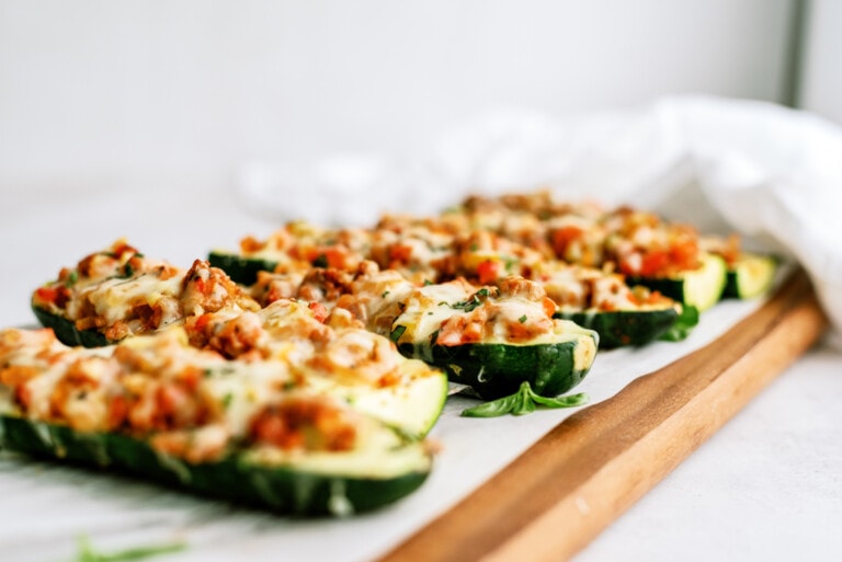 Sausage and Peppers Stuffed Zucchini Boats - Lauren's Latest
