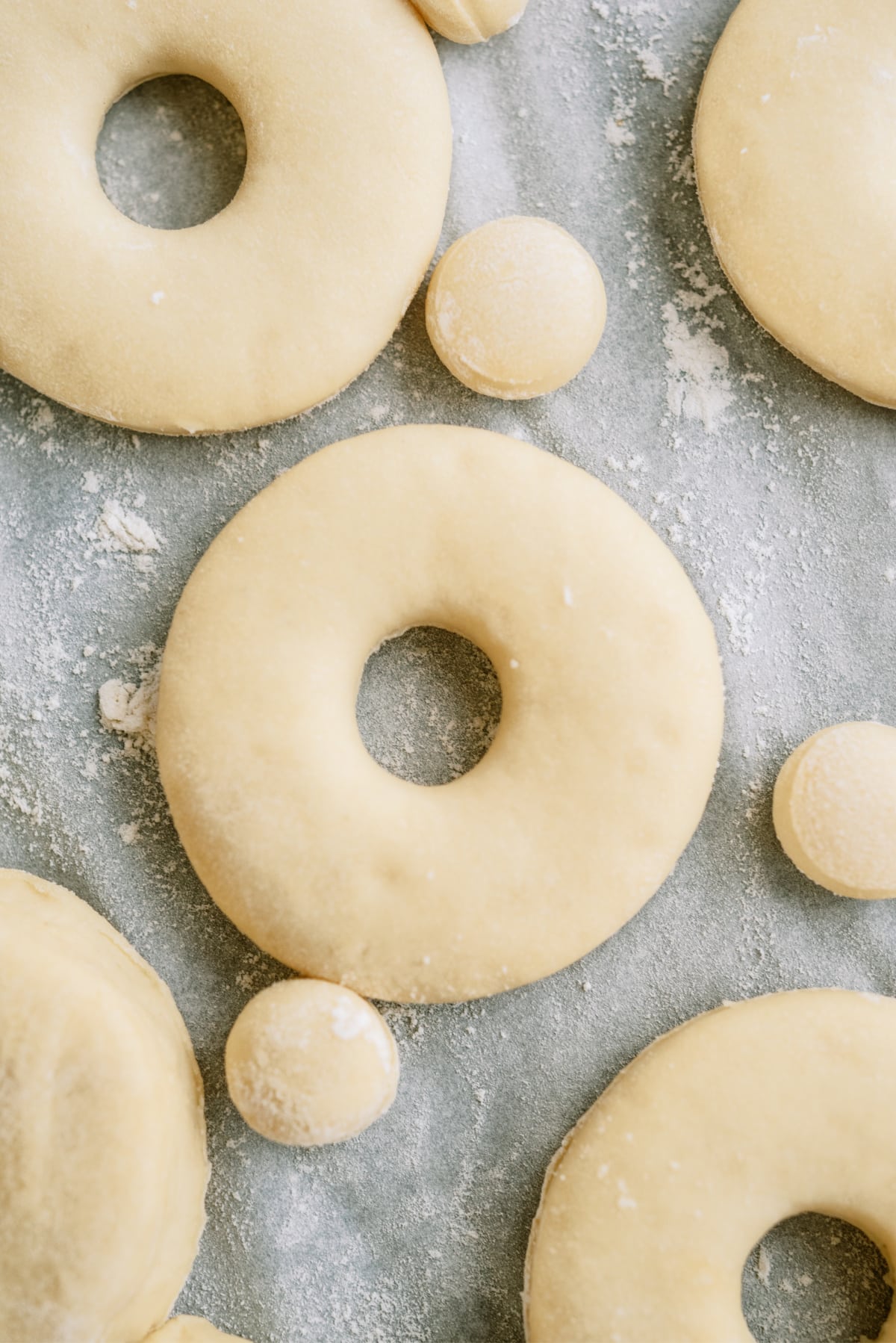 glazed-donuts dough on sheet pan