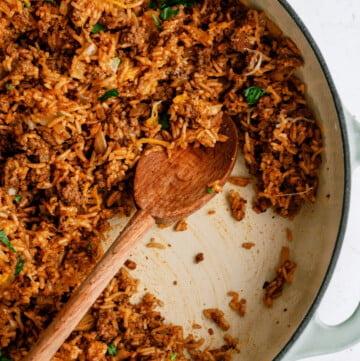 taco rice in pot with wooden spoon