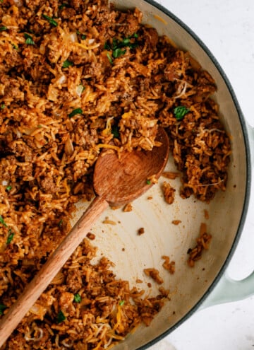 taco rice in pot with wooden spoon