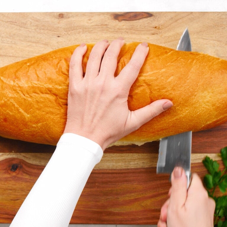 cutting french bread in half