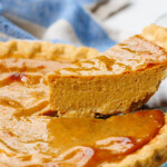 Pulling slice out of pumpkin pie