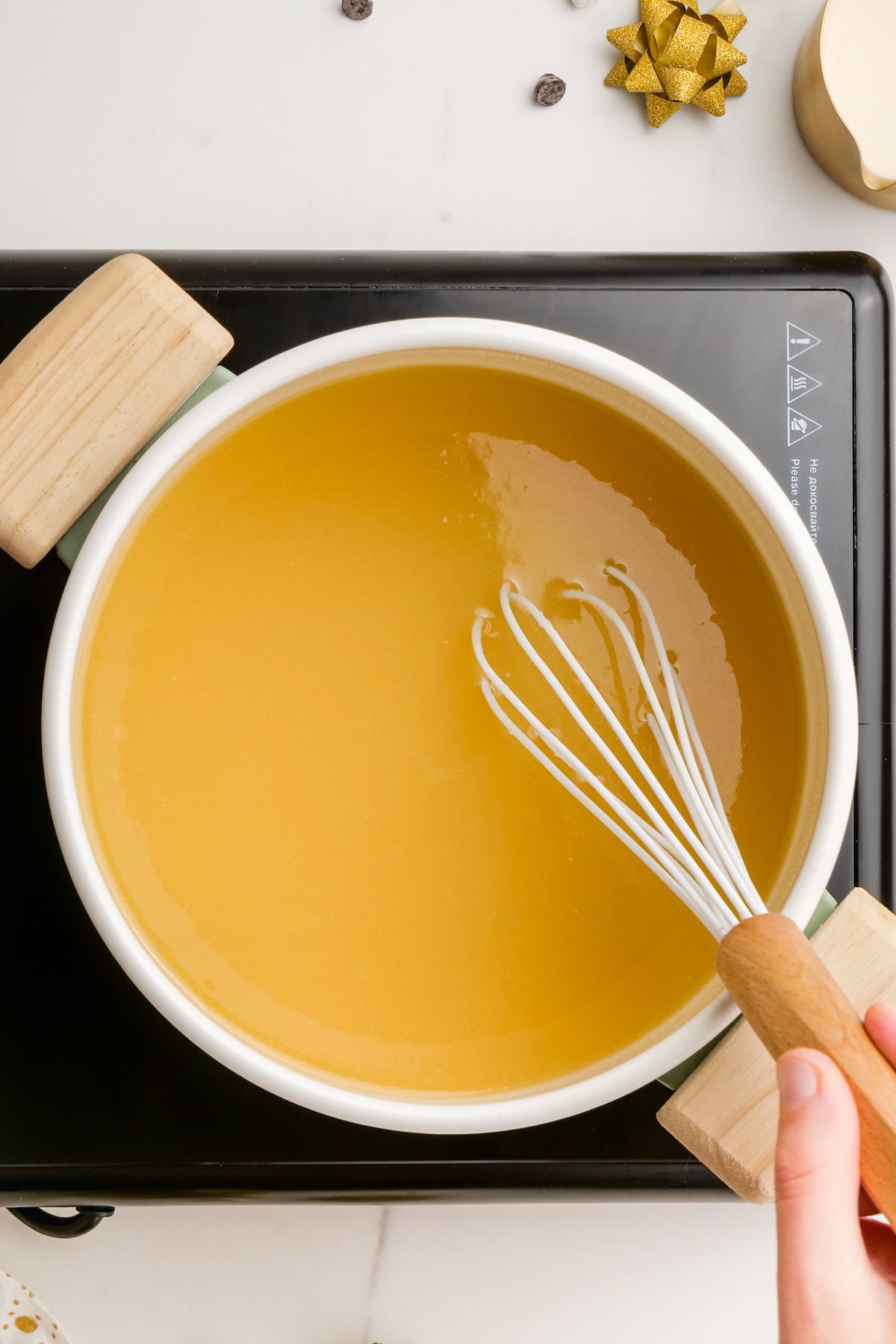 melted butter, sugar and evaporated milk in a pot