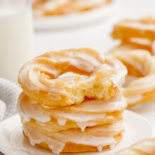 stack of french crullers on plate