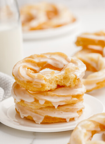 stack of french crullers on plate