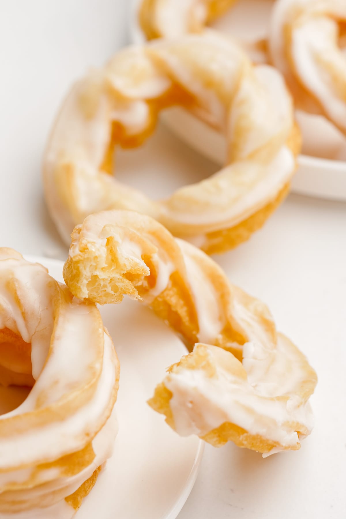 french crullers with bite taken out of one