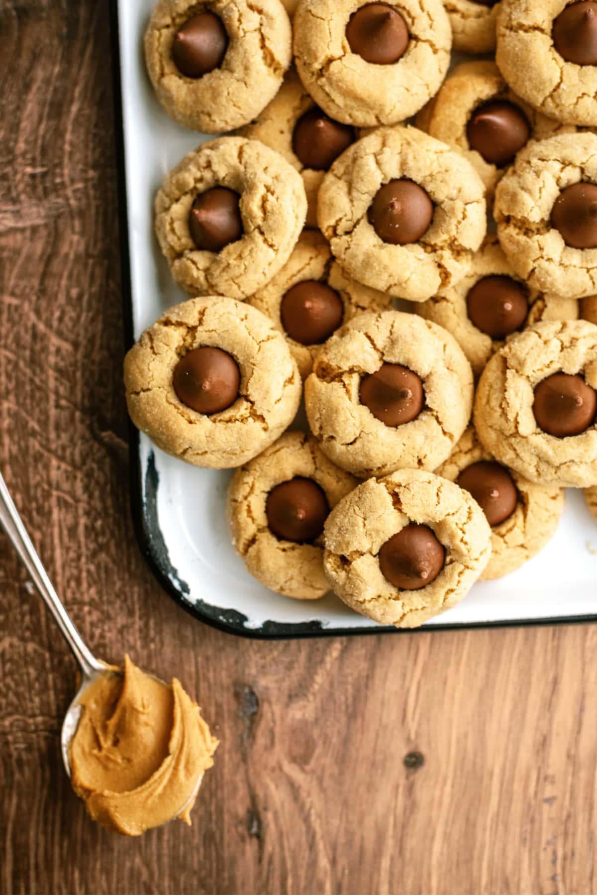 peanut-butter-blossoms with spoon of peanut butter