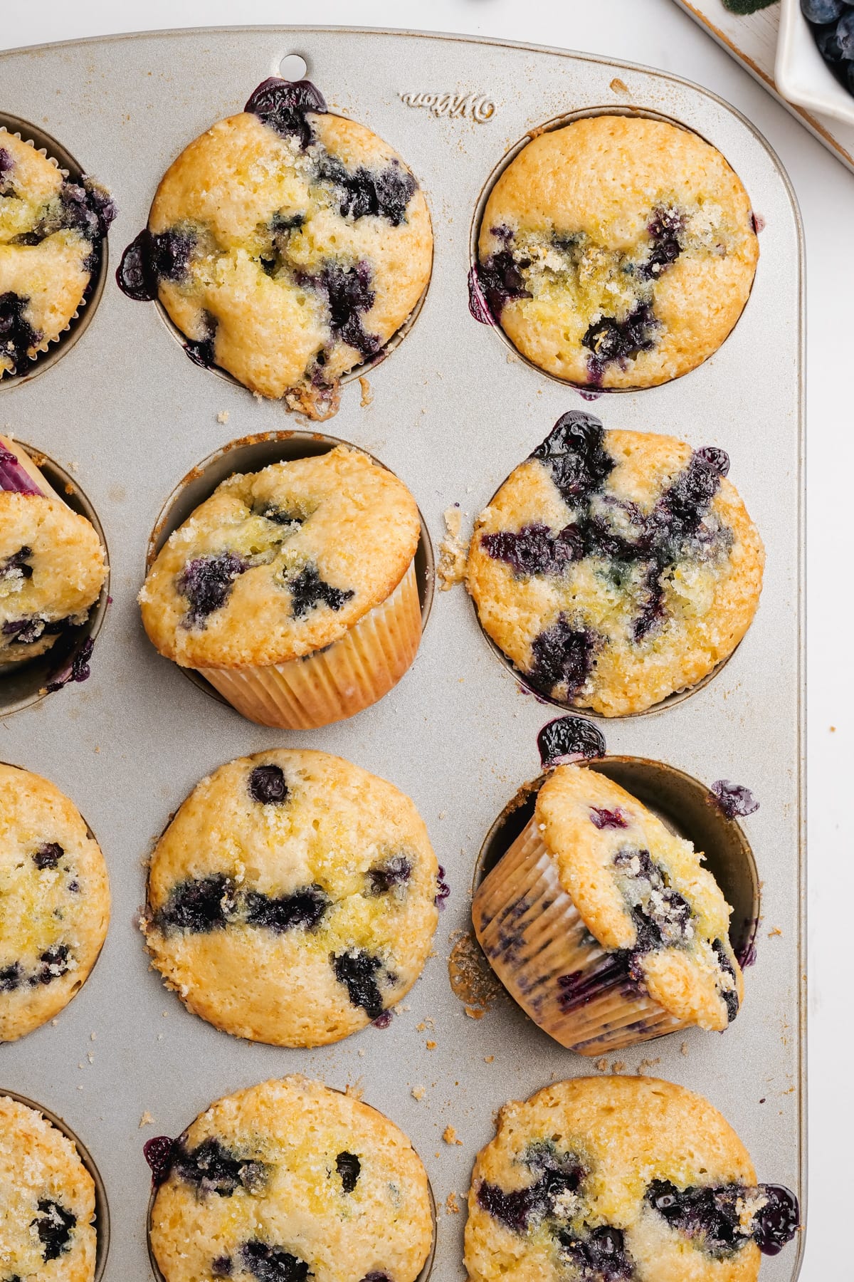 baked blueberry muffins in muffin tin