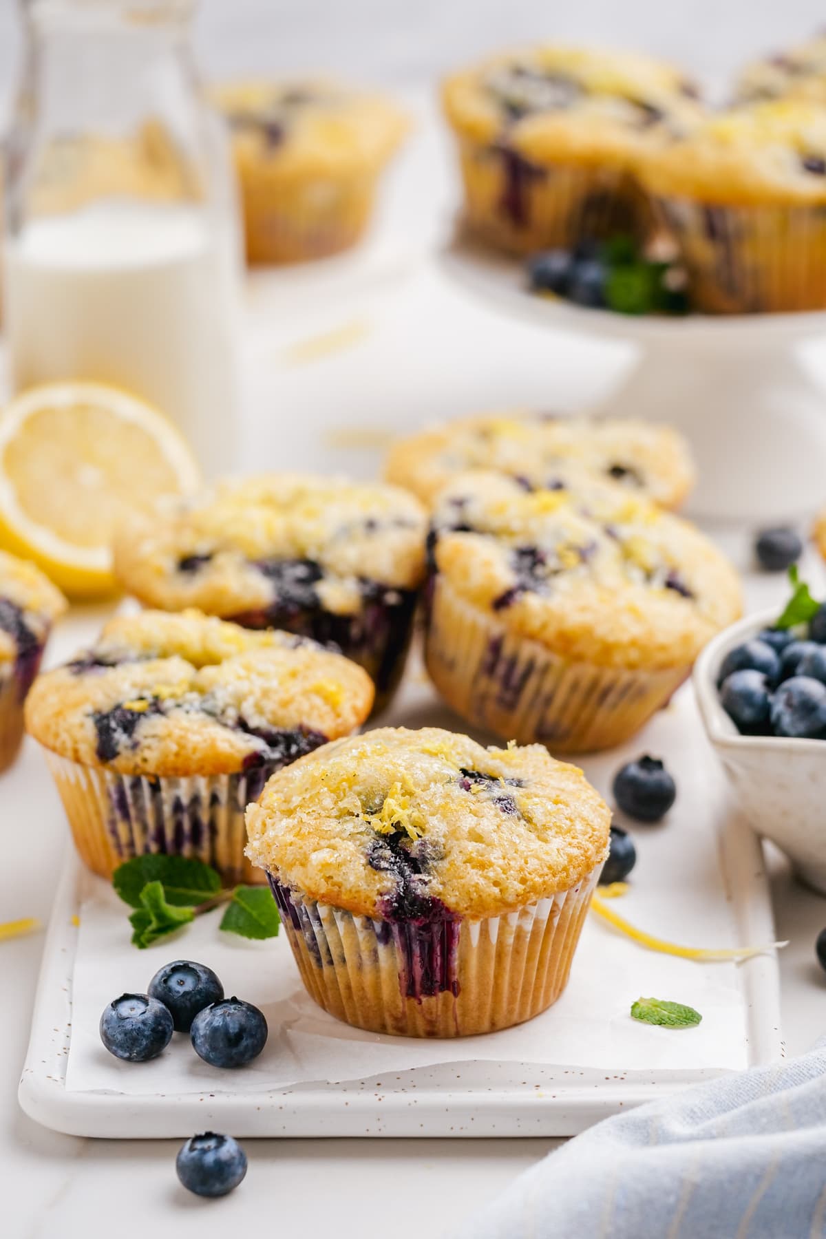 baked blueberry muffins on cutting board