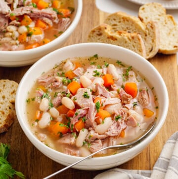 ham and bean soup in bowl with spoon