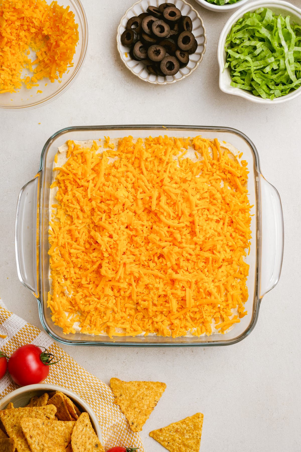 cheese layer of taco dip in casserole dish