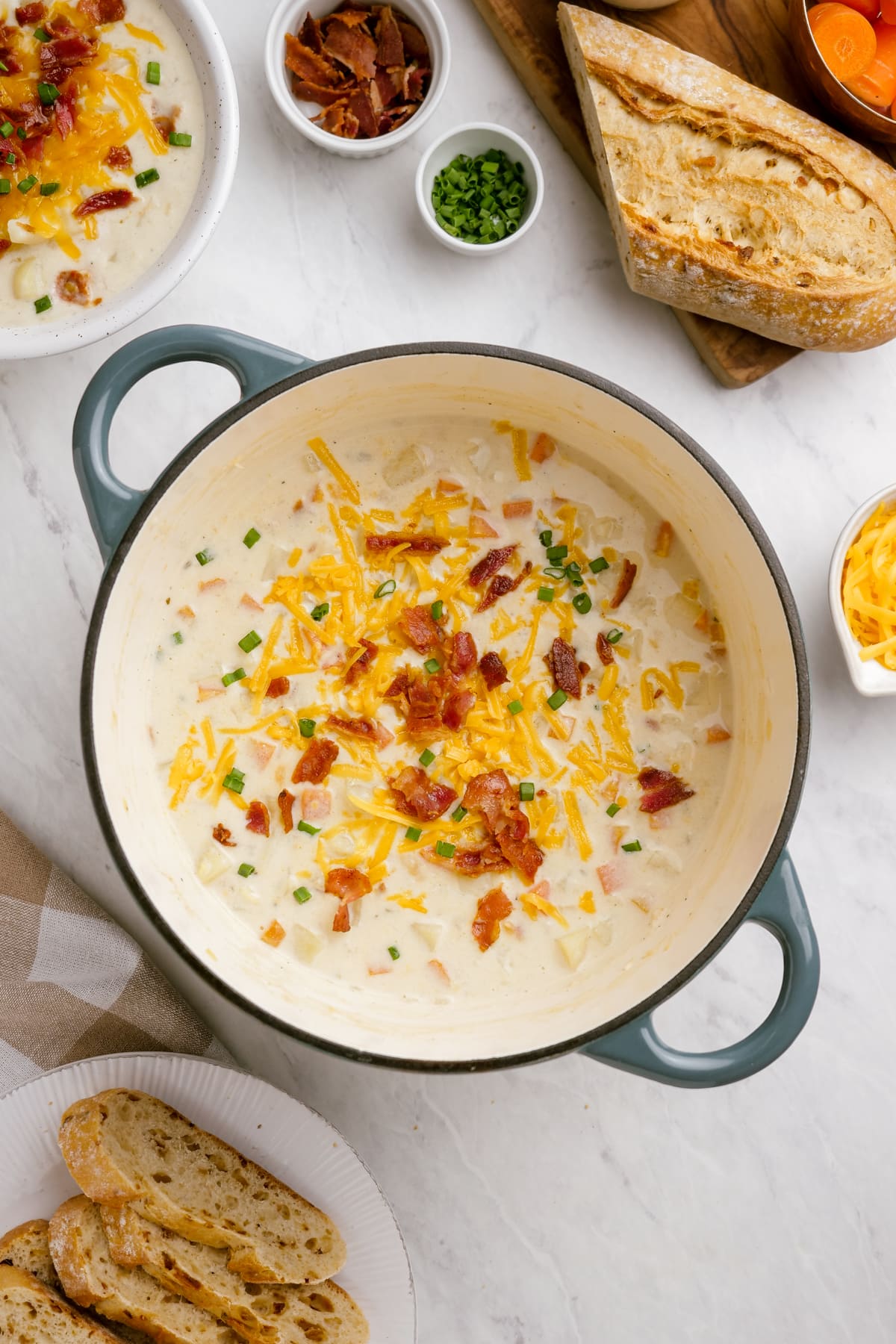 loaded-baked-potato-soup in pot on tablescape