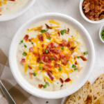 loaded-baked-potato-soup in bowls on tablescape